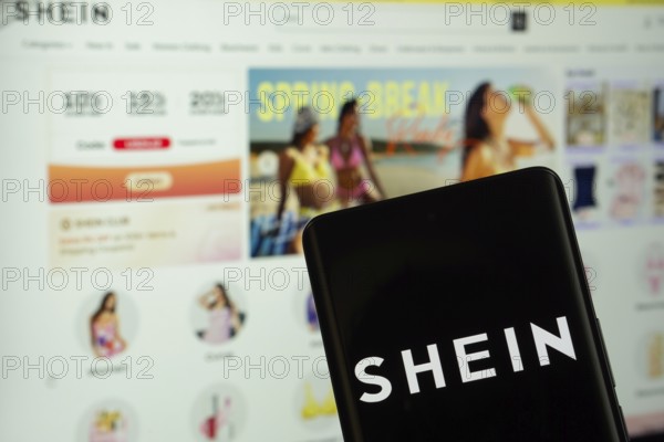 Dhaka, Bangladesh - 18 March 2025: The logo of the shein is displayed on a smartphone screen, and