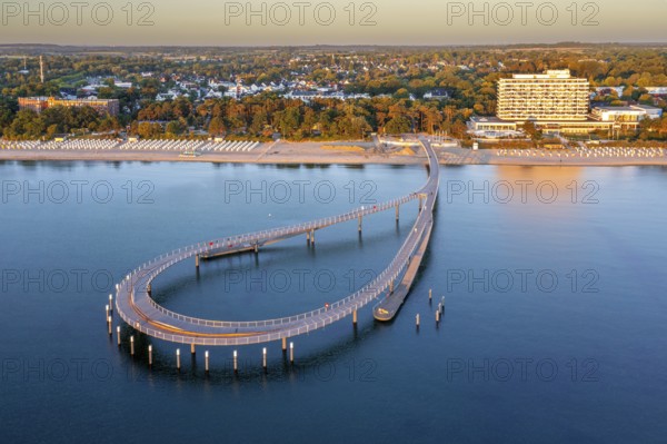 Aerial view over Maritim Seebrücke / maritime pier over the Baltic Sea at seaside resort