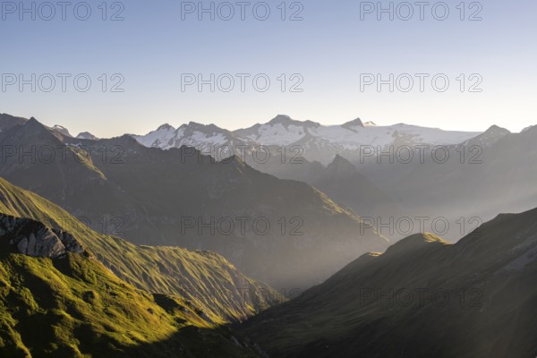 Mountain landscape in morning mood, view of the summit of the Großvenediger at sunrise, view from