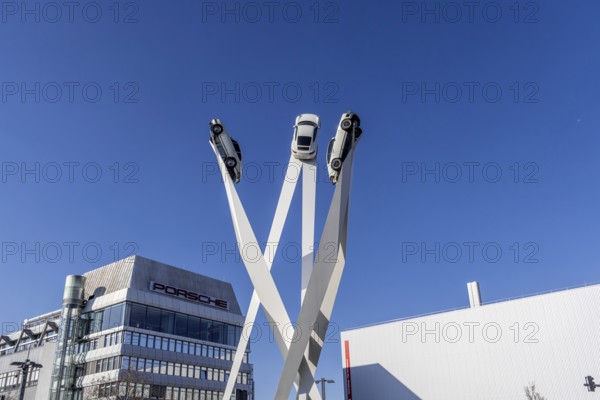 Inspiration 911 artwork by Gerry Judah: three steles, each presenting a Porsche 911 at a height of