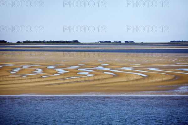 Schleswig-Holstein Wadden Sea National Park at low tide with sandbanks and mainland, North Frisia,