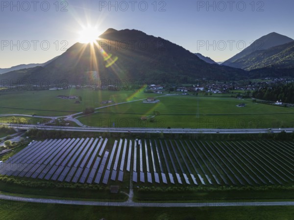 Aerial view, solar system, photovoltaics, morning light, backlight, mountains, sunny, spring, near