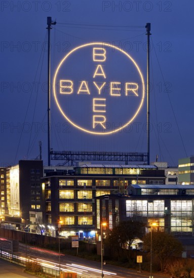 Bayer cross in the blue hour on the premises of Bayer AG, Leverkusen, Bergisches Land, North