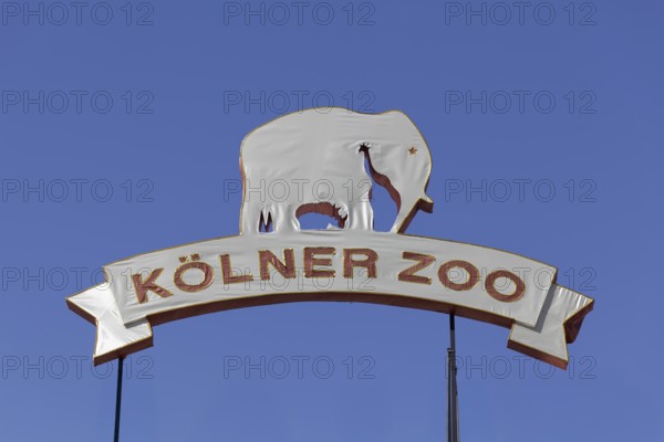 Cologne Zoo 165 years, anniversary sign covered with fabric in front of a blue sky, Cologne, North