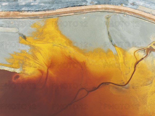 Waste pond in the mineral-rich area of the Rio Tinto mines. The colour is caused by oxidised iron