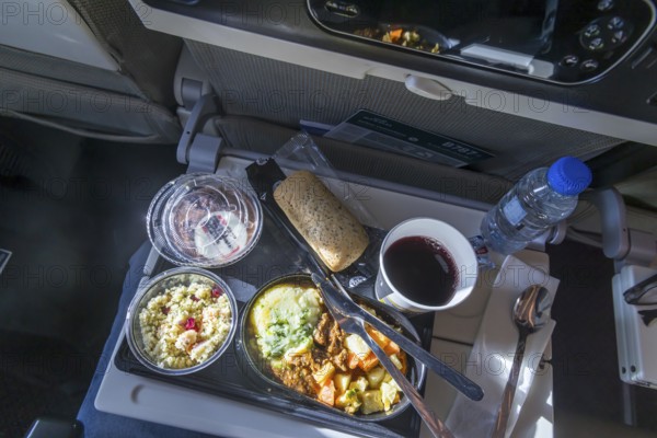 Catering on board an Etihad airline aircraft, interior, cabin. Boeing 787 aircraft, flight from Abu