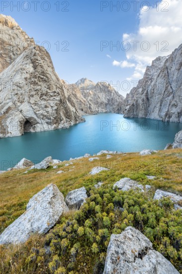 Turquoise mountain lake Kol Suu with rocky steep mountains, Kol Suu Lake, Sary Beles Mountains,
