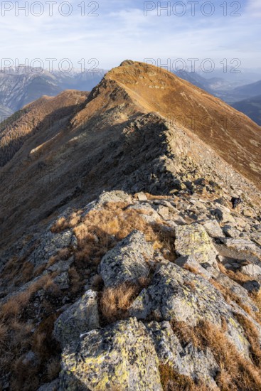 Venet ridge with Kreuzjoch summit, view from the Venet ridge to mountains of the Parzinn group in