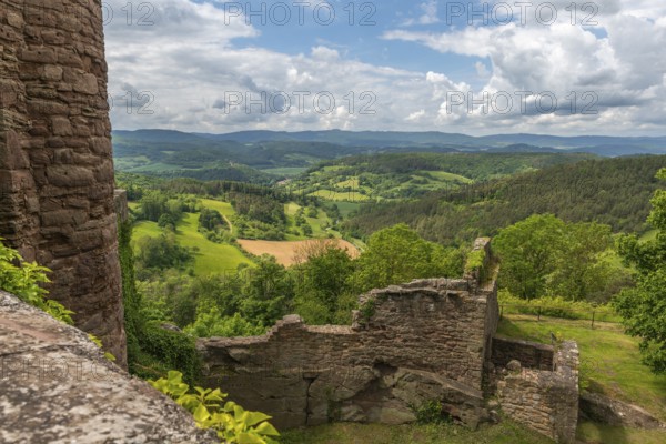 View from the medieval castle ruin Hanstein to the youth castle Ludwigstein and the wooded low