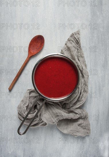 Tomato sauce with pepper and spices, Satsebeli, Georgian cuisine, red sauce, top view, homemade, no