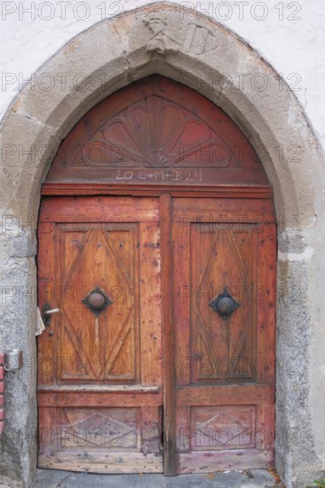 View of an old double wooden door, St. Lorenzen, Bolzano, Trentino, South Tyrol, Italy