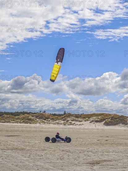 Recreational sport Beach kiting on the edge of the national park and UNESCO World Heritage Site,