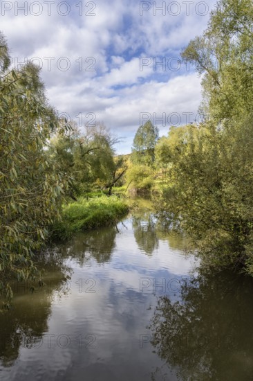 The Stockacher Aach flows through the autumn-coloured Stockacher Aachried into western Lake