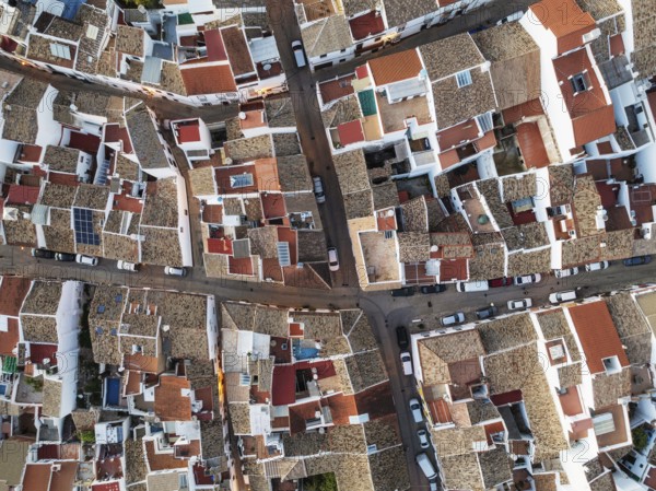 Streets and rooftops in the White Town of Olvera. Aerial view. Drone shot. Cádiz province,