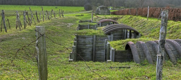 Reconstructed World War One trench with elephant shelters made of corrugated iron near WWI