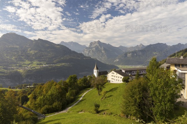 View of Amden with St Gallus church above Lake Walen, in the background Filzbach, Weesen and