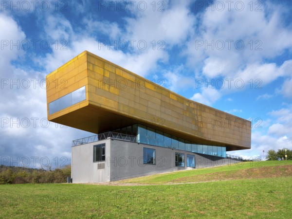 Nebra Ark on a green meadow with a cloudy sky, Museum of the Sky Disc, Visitor Centre, Nebra,