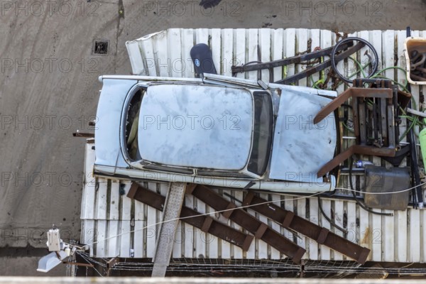 Metals are stored in a scrapyard in the harbour: scrap metal is a valuable raw material for