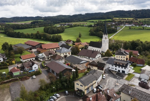 Drone shot, view of village with church, Sankt Marienkirchen am Hausruck, Hausruckviertel, Upper
