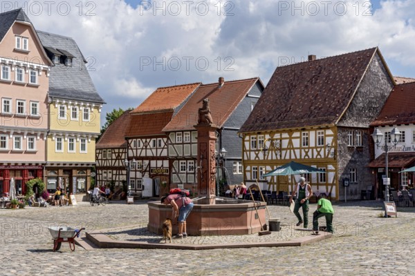 Craftsmen at the market fountain, reconstructed houses from Giessen, Giessener Zeile, Nordzeile,