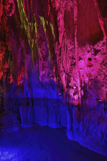 Stalactites illuminated by coloured light, stalactite cave, Höllgrotten, Baar, Canton Zug,