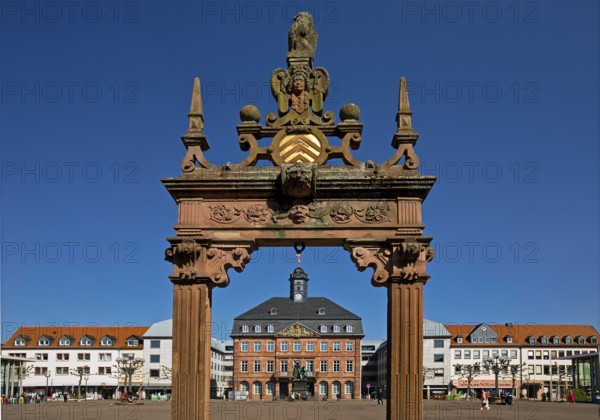 Neustadt Town Hall with the Brothers Grimm National Monument seen through the market fountain,