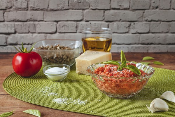 Food photography, making tomato pesto, with tomatoes (Solanum lycopersicum), salt, sunflower