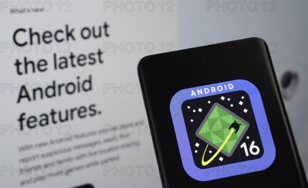 The logo of the Android 16 is displayed on a smartphone screen, with the android website visible on