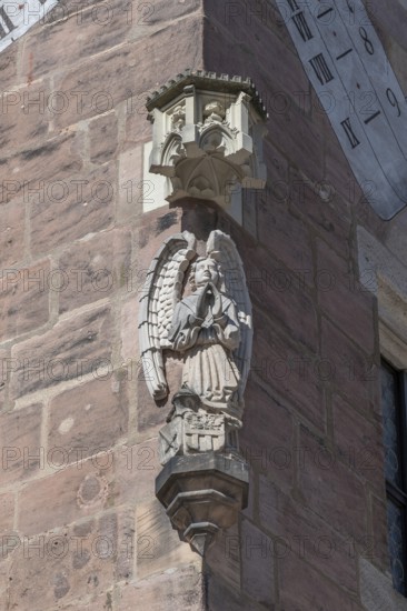 Angel figure, a house figure on the medieval residential tower, the Nassauer Haus, Lorenz Platz,