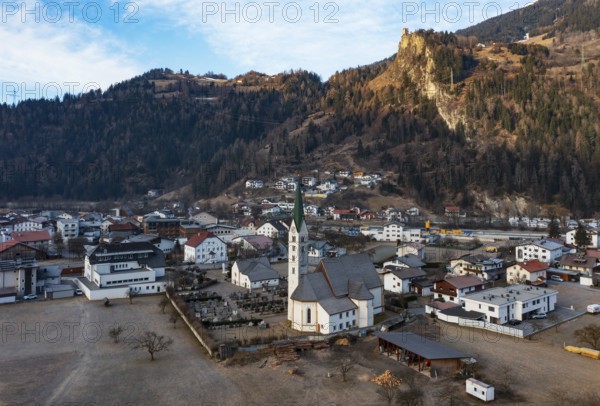 Drone shot, view of village with parish church, Prutz, Kaunertal, Inntal, Tyrol, Austria
