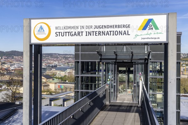 Youth hostel with DJH logo. Entrance area with a view of the state capital Stuttgart,