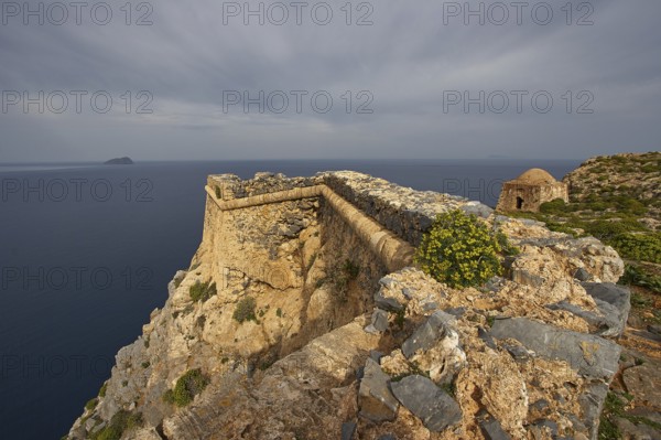 Venetian sea fortress Gramvoussa, morning light, cloudy sky, fortress walls, Pontikos Island,