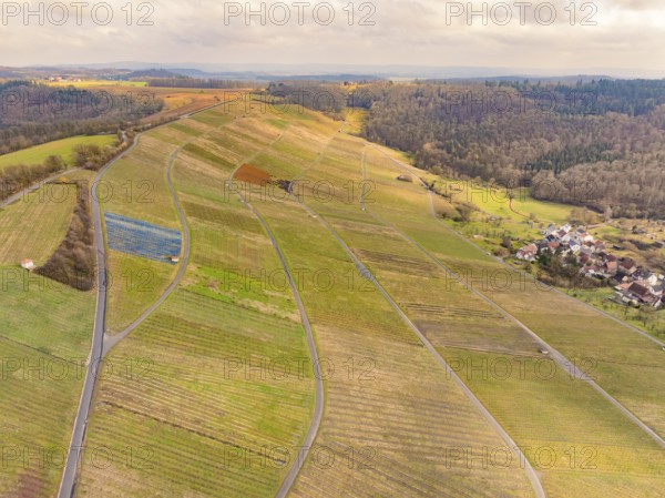Aerial view of agricultural fields and wooded hills in a rural area, Lichtenberg Castle,