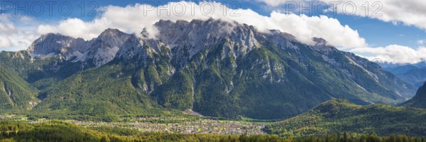 Panorama from Hoher Kranzberg, 1397m on Mittenwald, behind it the cloudy Karwendel Mountains,