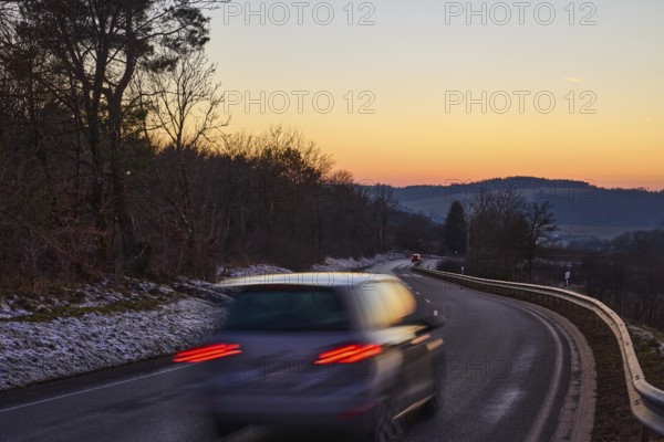 Country road, crash barrier, delineator, car, vehicle, brake light, reflector, motion blur, light