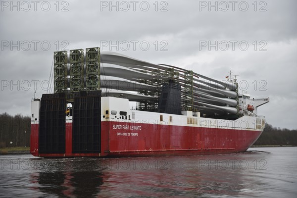 Ro-Ro Cargo ship, cargo ship Super Fast Levante travelling with rotor blades for wind turbines in