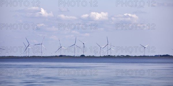 Schleswig-Holstein Wadden Sea National Park with a view of wind turbines on the mainland, North