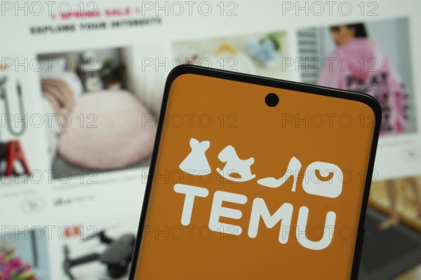 Dhaka, Bangladesh - 18 March 2025: The logo of the Temu is displayed on a smartphone screen, and