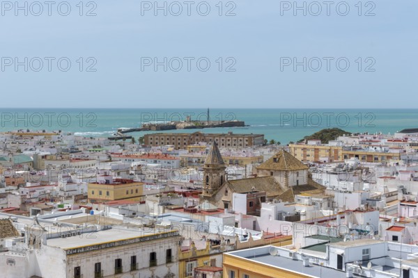 View of the Castillo de San Sebastian, from the Torre Tavira tower over the historic centre of