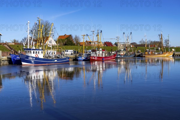 The fishing village of Greetsiel, historic fishing harbour, with the largest shrimp cutter fleet in