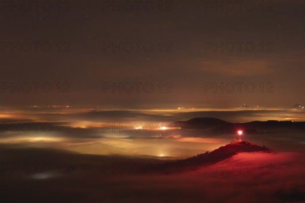 New Year's Eve fireworks 2024 on the Breitenstein, Swabian Alb near Ochsenwang. Sea of fog in the
