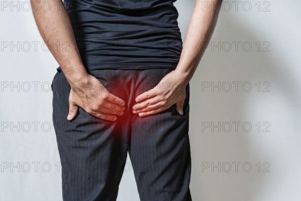 Person suffering with hemorrhoid problem isolated. People with diarrhea problem touching buttock