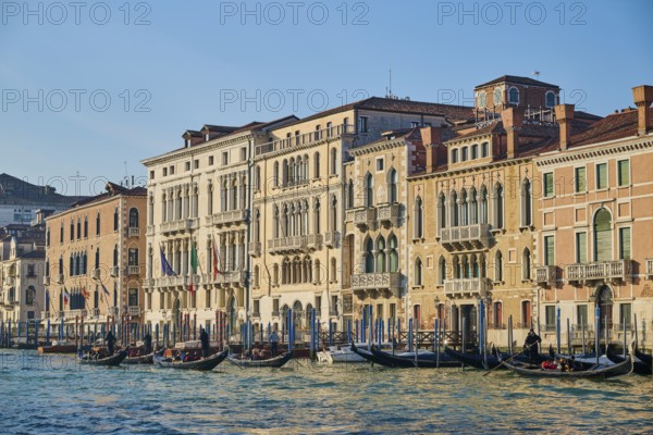 View from 'Canal Grande' on the houses and boats lying in the water in Venice on a sunny day in