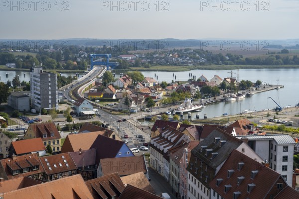 Town view with castle island, Peene river and Peene bridge, view from the tower of St Peter's