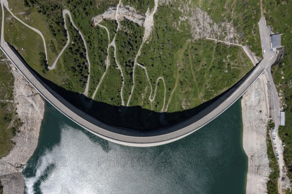 Aerial view of the dam wall at Lago di Lei in the Valle di Lei in the border region Italy,