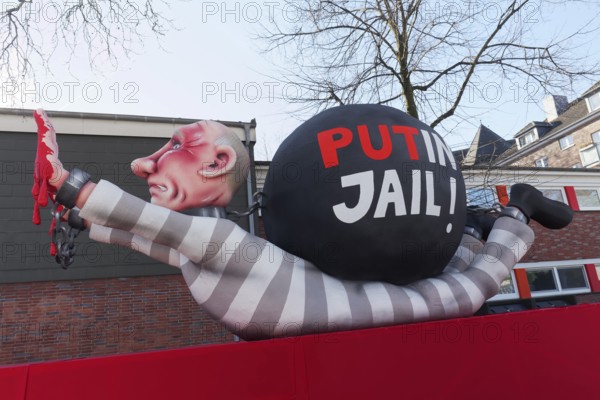Russian President Vladimir Putin as a convict with blood on his hands, Put In Jail, papier-mâché