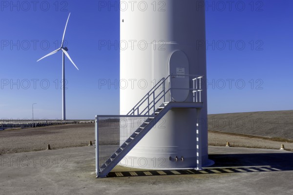 Entrance door to wind turbine tower at wind park, windfarm at Neeltje Jans, Eastern Scheldt storm