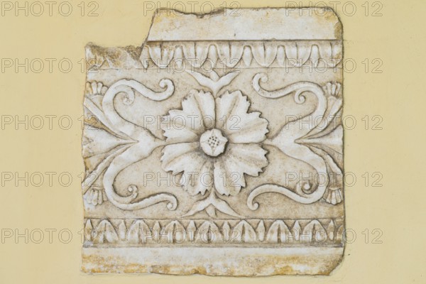 Bas-relief with rosette, tendrils and leaf sticks, fragment of a frieze, Städtisches Lapidarium,