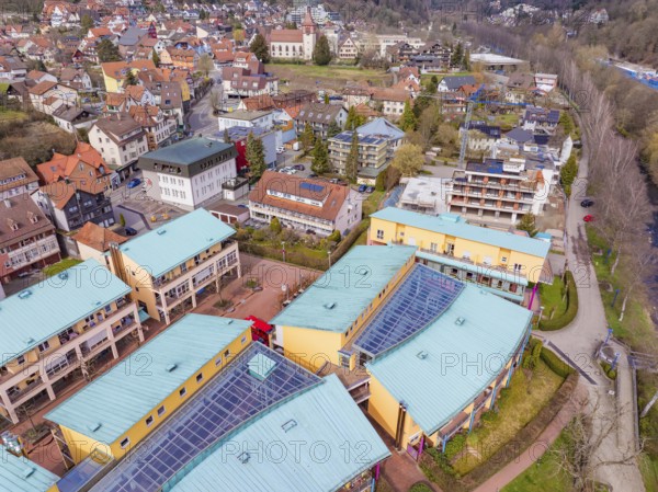 Urban landscape with green areas and colourful roofs in a peaceful spring atmosphere, Bad