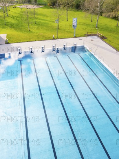 Long swimming lanes in the outdoor pool surrounded by greenery, Calw Stammheim outdoor pool, Calw,